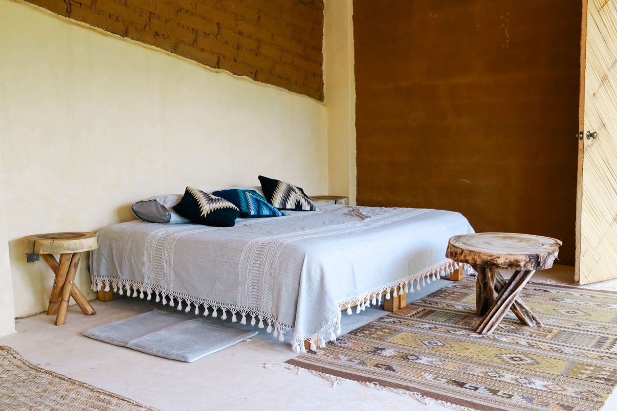 Loft bedroom with earth walls