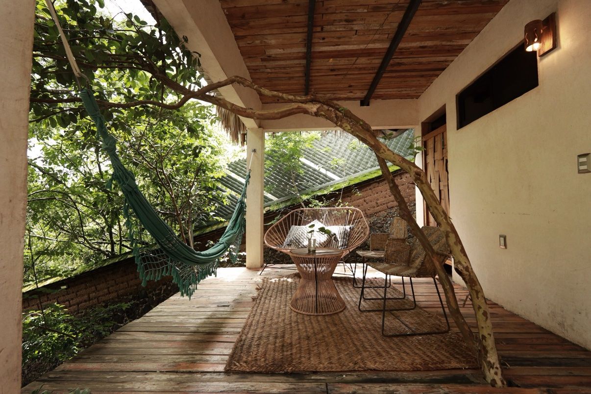 Safari tent porch with hammock and seating